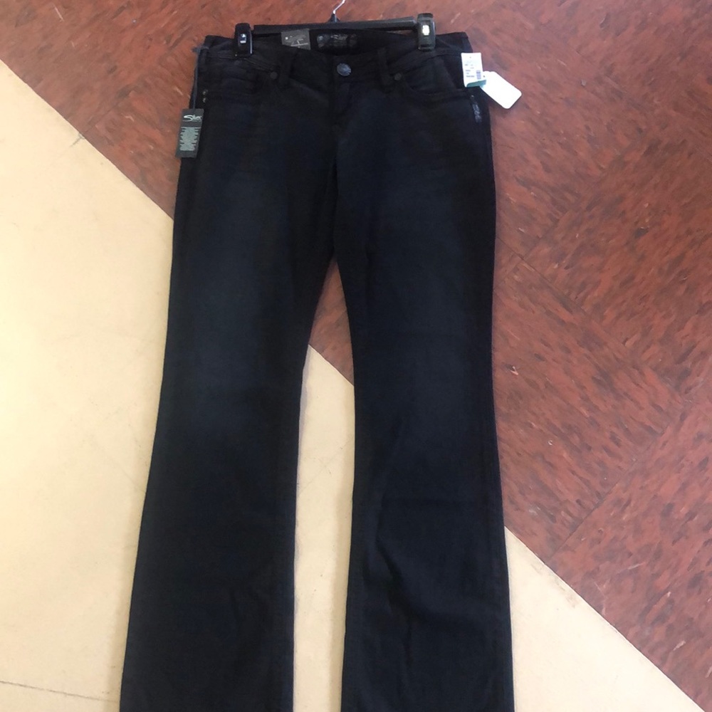 Silver jeans with tags